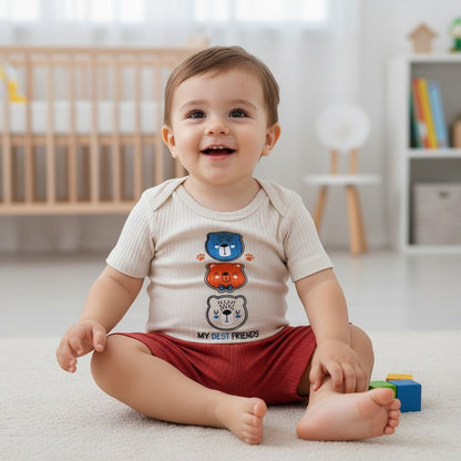 The Nile Luxuries baby boys ribbed knit short sleeve bodysuit with stacked bear graphic and shorts set in cream and rust.