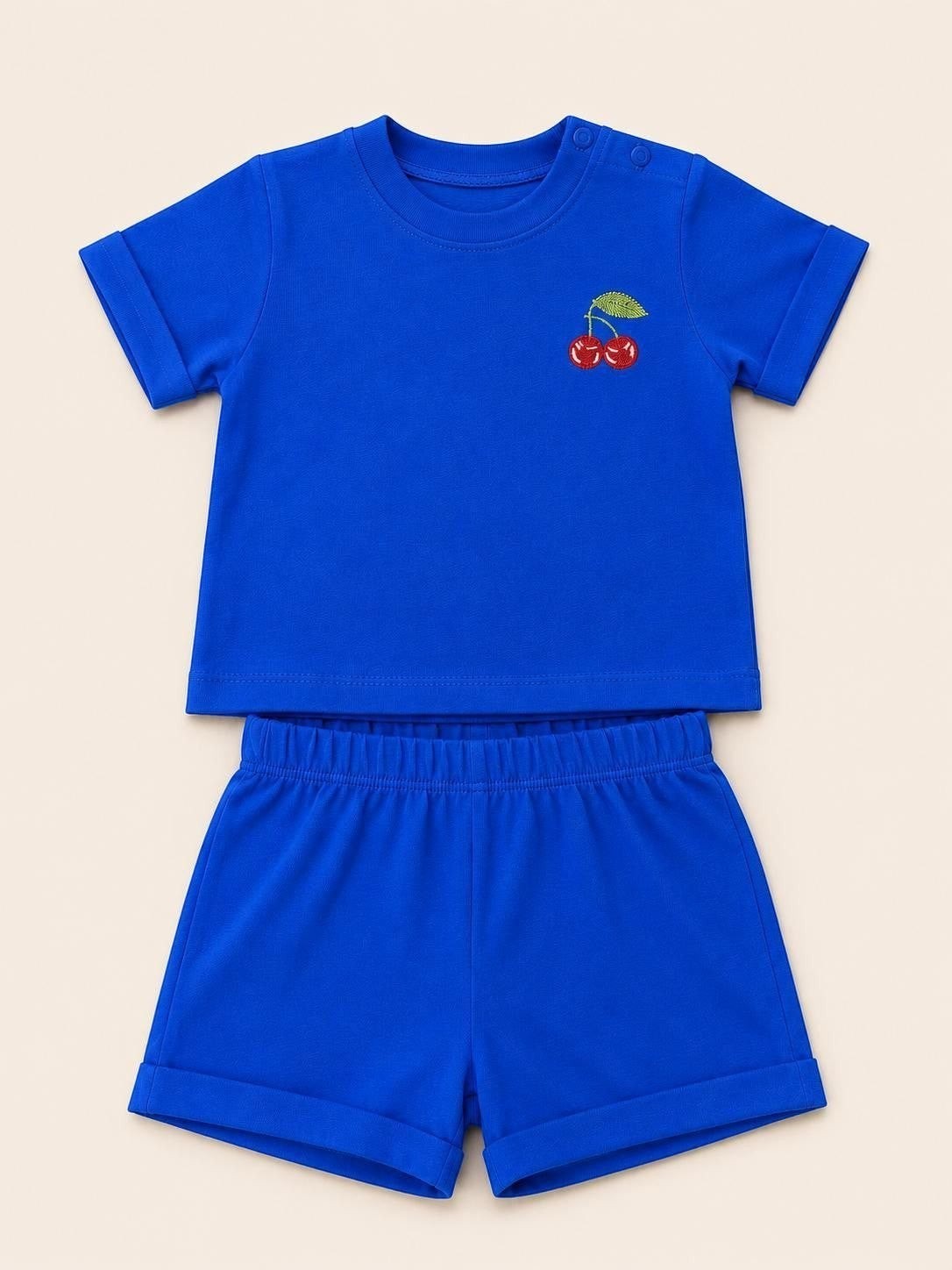 The Nile Luxuries toddler blue short sleeve t-shirt and shorts set with embroidered cherry detail and cuffed hems.
