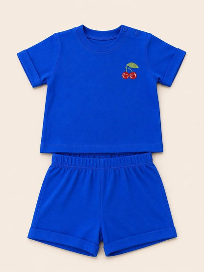 The Nile Luxuries toddler blue short sleeve t-shirt and shorts set with embroidered cherry detail and cuffed hems.