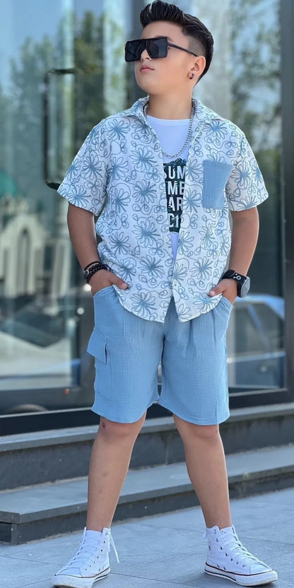 The Nile Luxuries boys' short sleeve button-up shirt with floral print and blue shorts set.