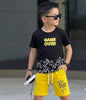 The Nile Luxuries boys gaming outfit with a black Game Over t-shirt and yellow drawstring shorts with controller print.