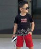 The Nile Luxuries boys gaming outfit with a black Game Over graphic t-shirt and red drawstring shorts on a young boy.