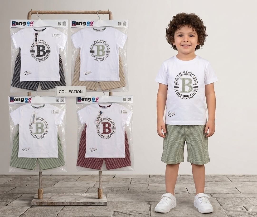 The Nile Luxuries boys white graphic t-shirt and textured green shorts outfit set worn by a young boy