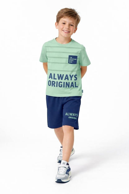 The Nile Luxuries boys' two-piece outfit with a light green striped graphic t-shirt and navy blue casual shorts.