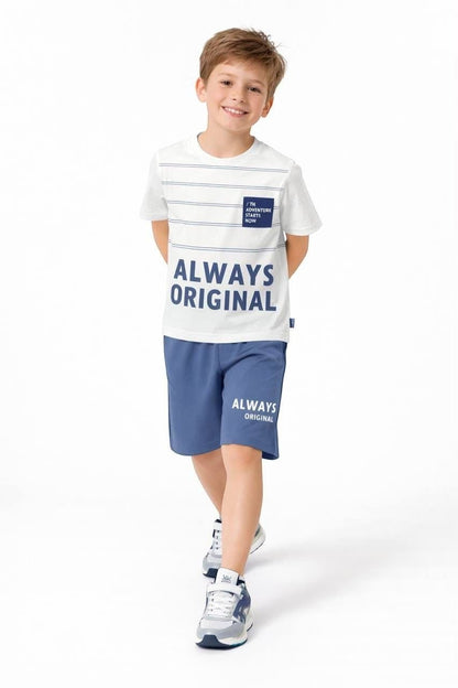 The Nile Luxuries boys' white striped graphic t-shirt and blue shorts set with Always Original print on a young boy.