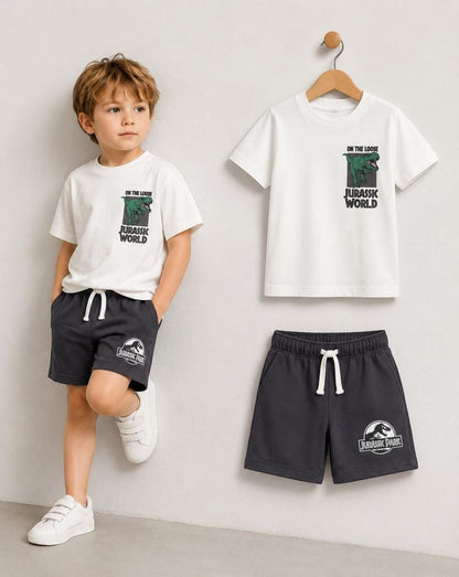 The Nile Luxuries boys' white Jurassic World t-shirt and charcoal shorts set. Features dinosaur graphic.