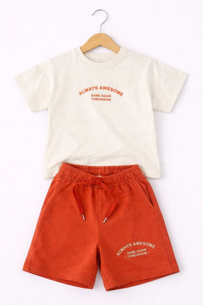The Nile Luxuries boys lounge set with a cream t-shirt and rust orange shorts featuring Always Awesome graphic print.