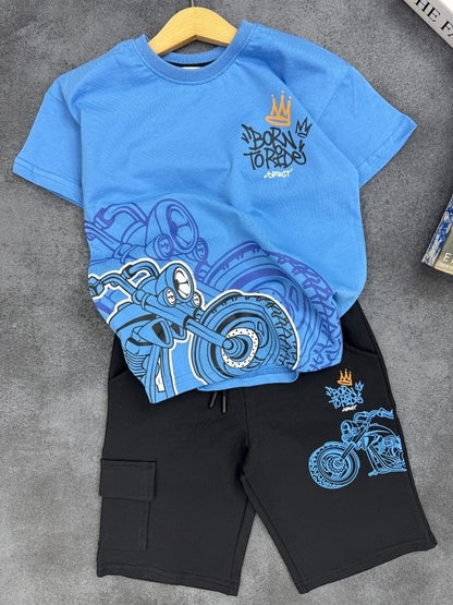 The Nile Luxuries boys' blue graphic t-shirt with motorcycle print and black cargo shorts with drawstring waist.