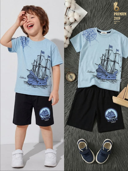 The Nile Luxuries boys nautical t-shirt and black shorts set with sailboat graphic and compass design.
