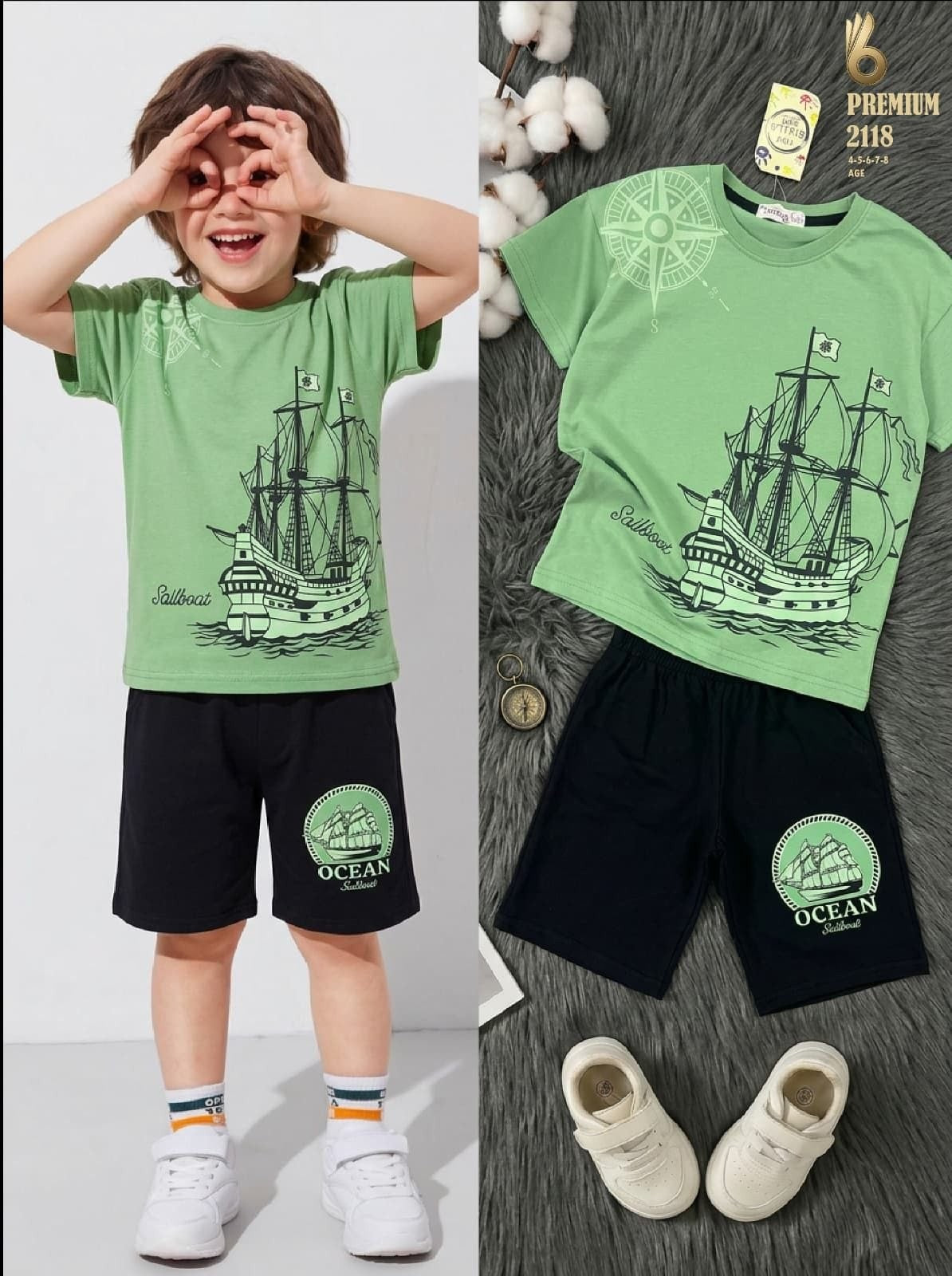 The Nile Luxuries boys nautical t-shirt and black shorts set with sailboat graphic and compass print.