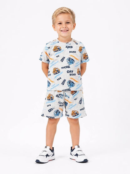 Young boy wearing a grey The Nile Luxuries short sleeve t-shirt and shorts set with off-road vehicle print.