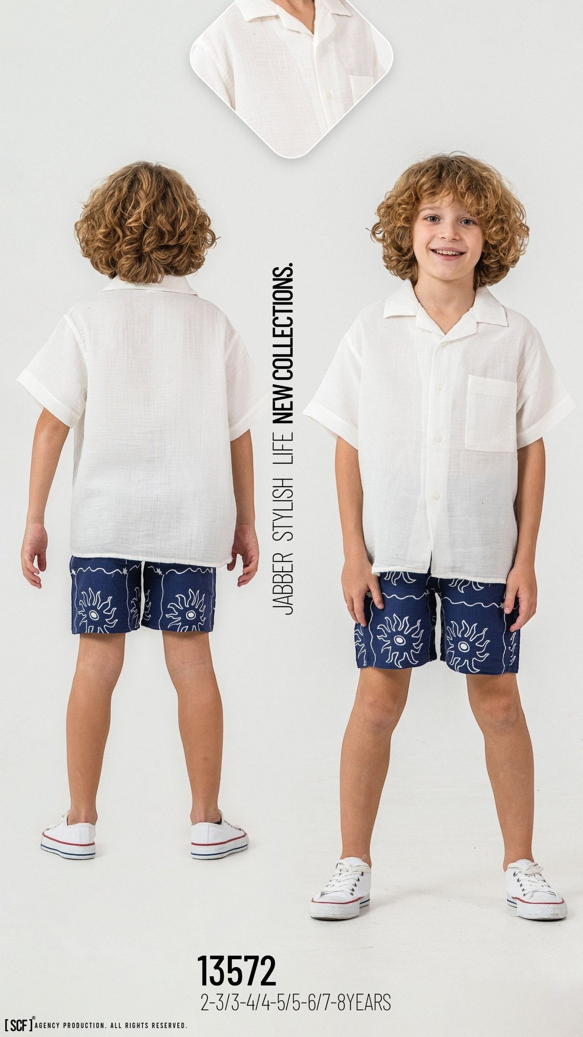 The Nile Luxuries boys white short sleeve button down shirt and navy blue sun print shorts summer outfit set