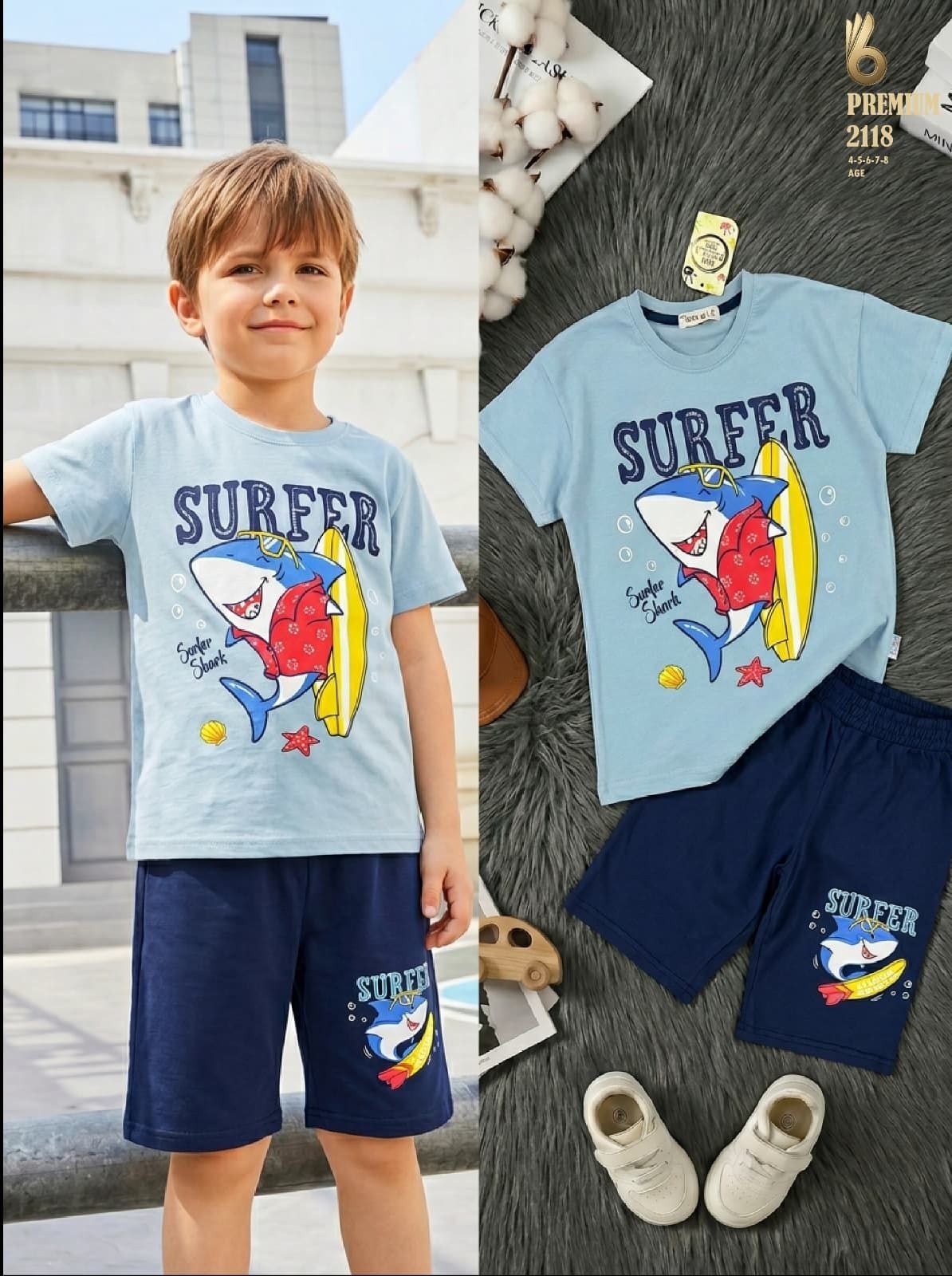 The Nile Luxuries boys' light blue t-shirt and navy shorts set featuring a fun shark surfer graphic print.