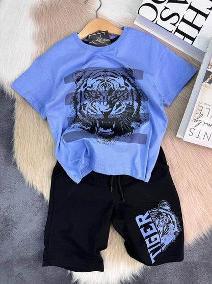 The Nile Luxuries boys blue t-shirt with tiger graphic and black shorts with tiger graphic. Cotton blend.