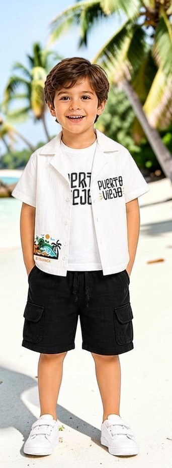 The Nile Luxuries boys white short sleeve camp shirt with tropical graphic and black cargo shorts.