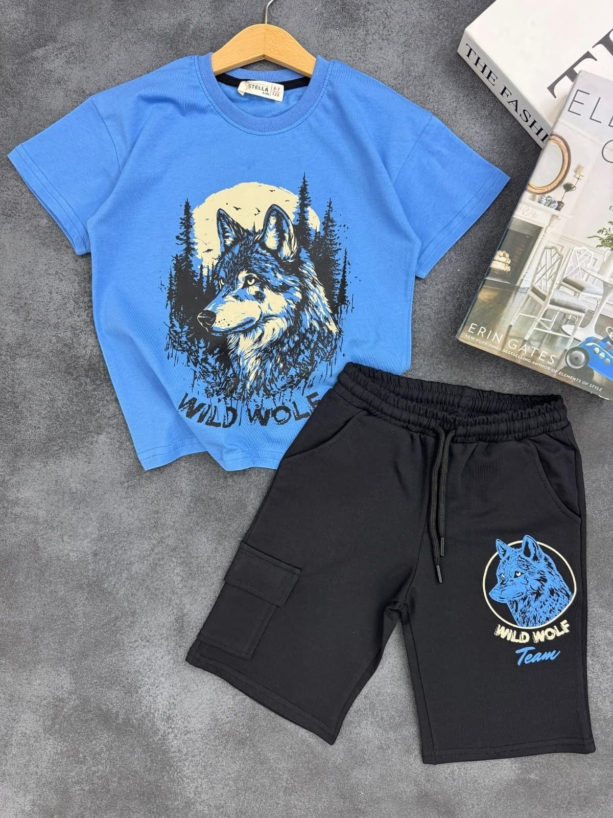 The Nile Luxuries blue wolf graphic t-shirt and black cargo shorts set with drawstring waist for boys.