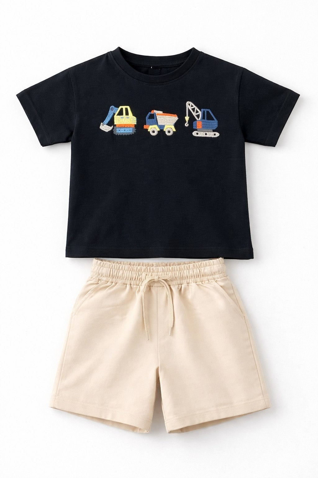 The Nile Luxuries children's black short-sleeve t-shirt with construction vehicle embroidery and beige drawstring shorts.