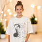 The Nile Luxuries cream cotton t-shirt with a dissolving musical note graphic print. Relaxed fit, short sleeves.
