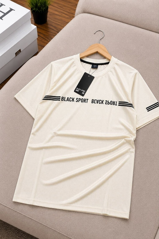 The Nile Luxuries cream performance crew neck t-shirt with black chest stripes and micro-mesh breathable fabric.