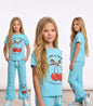 The Nile Luxuries girls light blue cotton lounge set with cherry graphic t-shirt and matching flared pants.