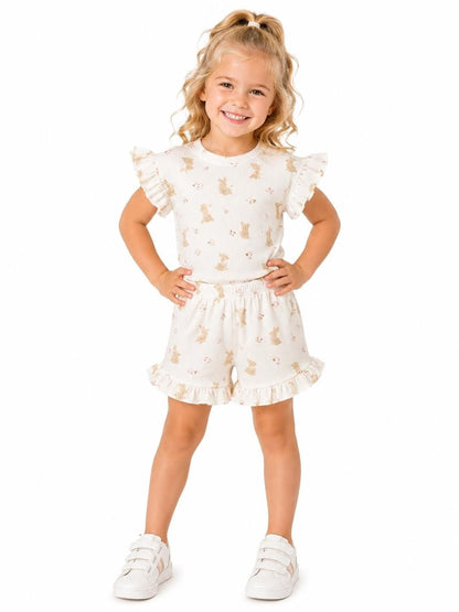 The Nile Luxuries girls' ivory ribbed knit set with ruffled sleeves and shorts featuring a bunny print.