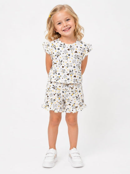 The Nile Luxuries girls white lounge set with bunny print, flutter sleeves, and ruffle trim on shorts and top.