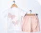 The Nile Luxuries white cotton t-shirt with two pink butterfly appliques and a pastel pink ruffled skirt with elastic waistband.