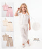 The Nile Luxuries girls eyelet embroidered shirt and wide-leg trouser set in white, featuring floral lace details.