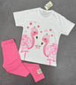 The Nile Luxuries girls two-piece set with white flamingo graphic t-shirt and vibrant pink ribbed leggings.