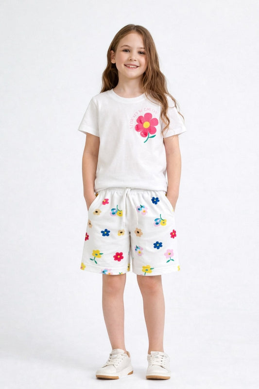 The Nile Luxuries girls white lounge set with a floral graphic t-shirt and matching flower-print drawstring shorts.