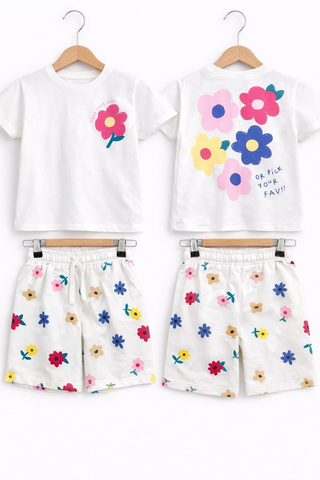 The Nile Luxuries girls white cotton-blend lounge set with vibrant floral graphics on the t-shirt and matching shorts.