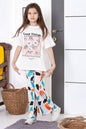 The Nile Luxuries girls lounge set with white graphic t-shirt and colorful abstract print wide-leg trousers