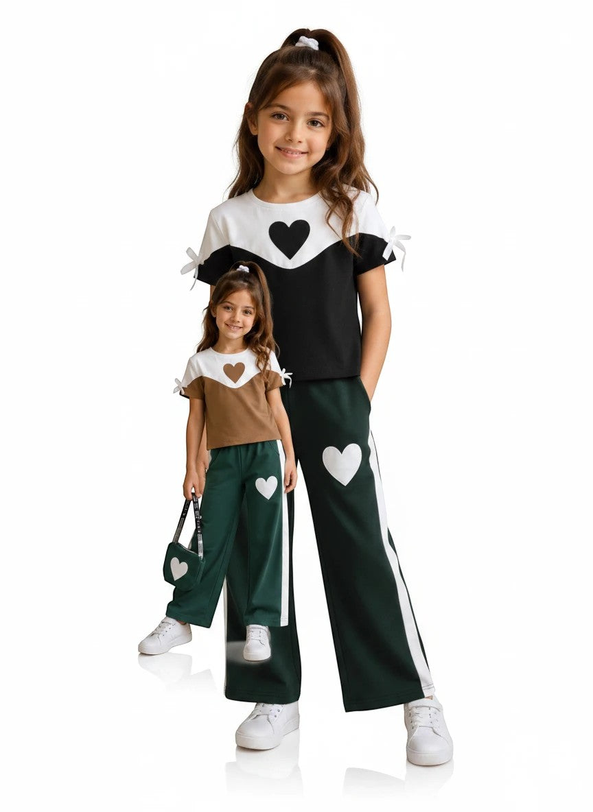 The Nile Luxuries girls heart graphic short sleeve top and wide leg pants lounge set in black and green