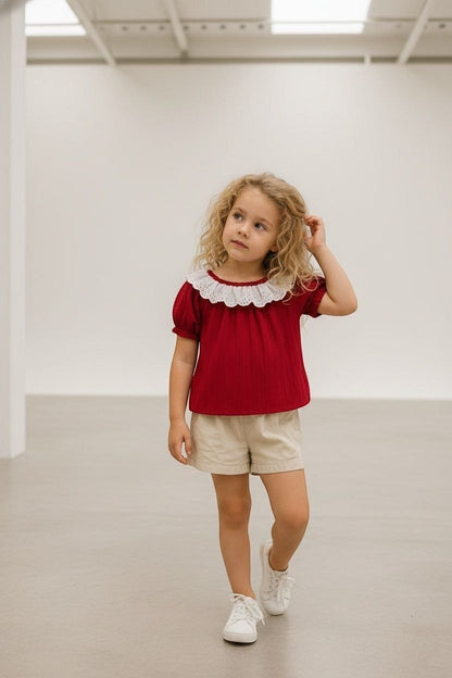 The Nile Luxuries Girls red textured puff sleeve top with white lace collar and ribbed knit fabric.