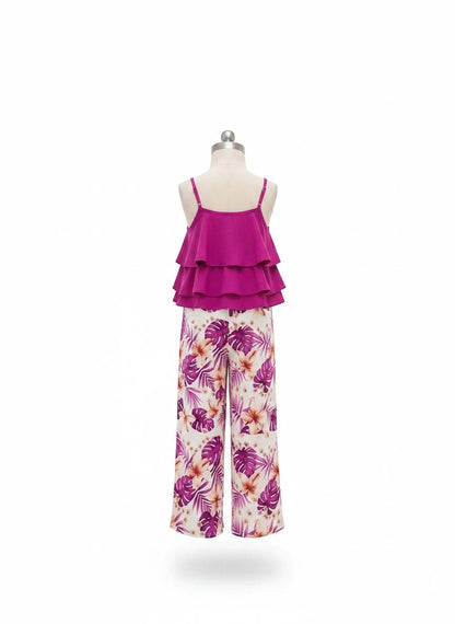 The Nile Luxuries girls tiered ruffle camisole top in fuchsia paired with wide-leg palazzo pants with a tropical print.