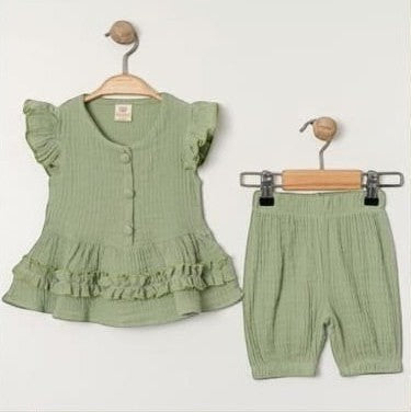 The Nile Luxuries girls sage green cotton gauze ruffle sleeve top and bubble shorts set. Eyelet details on top.