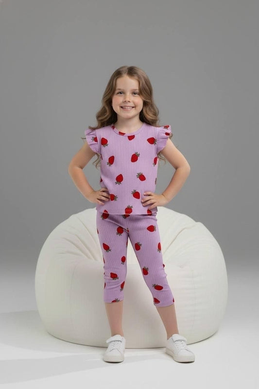 Young girl wearing The Nile Luxuries lavender ribbed strawberry print lounge set with flutter sleeves and leggings.