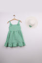 The Nile Luxuries green and white gingham ruffle dress with bow straps and matching hat. Lightweight fabric, perfect for summer.