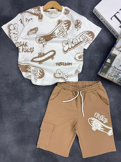 The Nile Luxuries kids two-piece set with white graphic t-shirt and tan cargo shorts featuring skateboard prints.