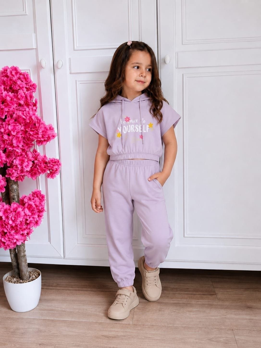 The Nile Luxuries girls lavender short sleeve hoodie and jogger set with floral graphic and elasticated waistband