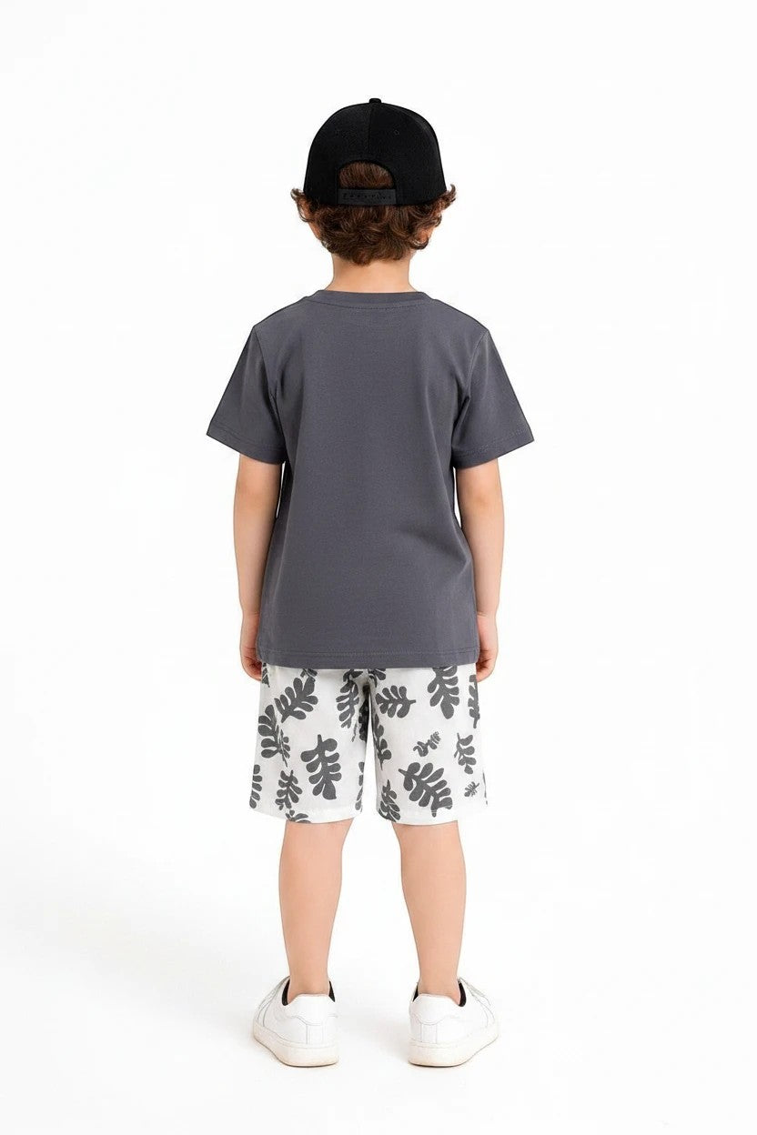 The Nile Luxuries boys' grey t-shirt and leaf print shorts set. Short-sleeved tee with elastic waist shorts.