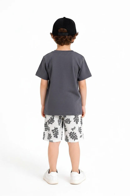 The Nile Luxuries boys' grey t-shirt and leaf print shorts set. Short-sleeved tee with elastic waist shorts.