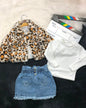 The Nile Luxuries three-piece outfit with a leopard faux-fur jacket, white ribbed top, and denim star-pocket skirt.