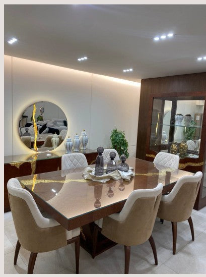 The Nile Luxuries modern dining set with dark wood table, gold inlay, and upholstered chairs. Features buffet and hutch.
