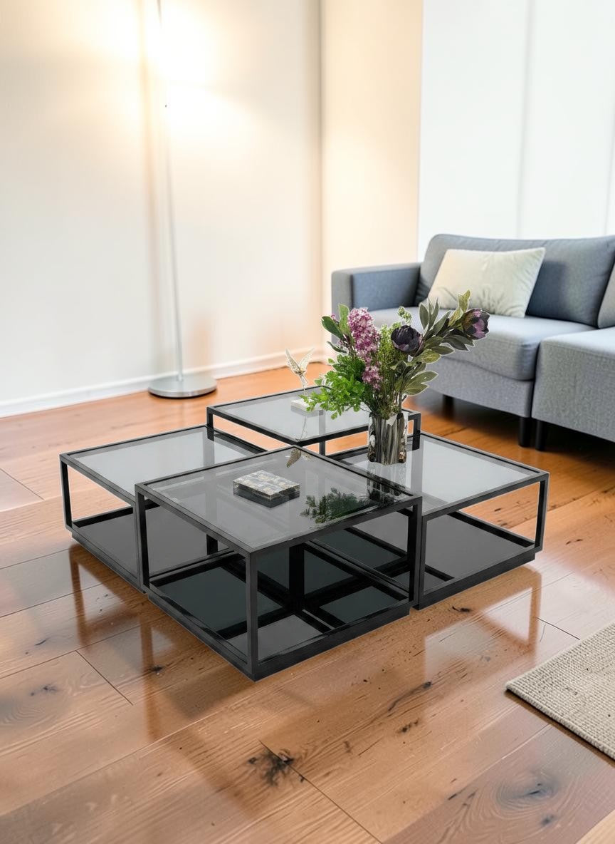 The Nile Luxuries modular coffee table with black frame and mirrored glass tops. Features a contemporary geometric design.