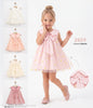 The Nile Luxuries girls pink tulle dress with daisy embroidery, Peter Pan collar, and oversized bow detail.