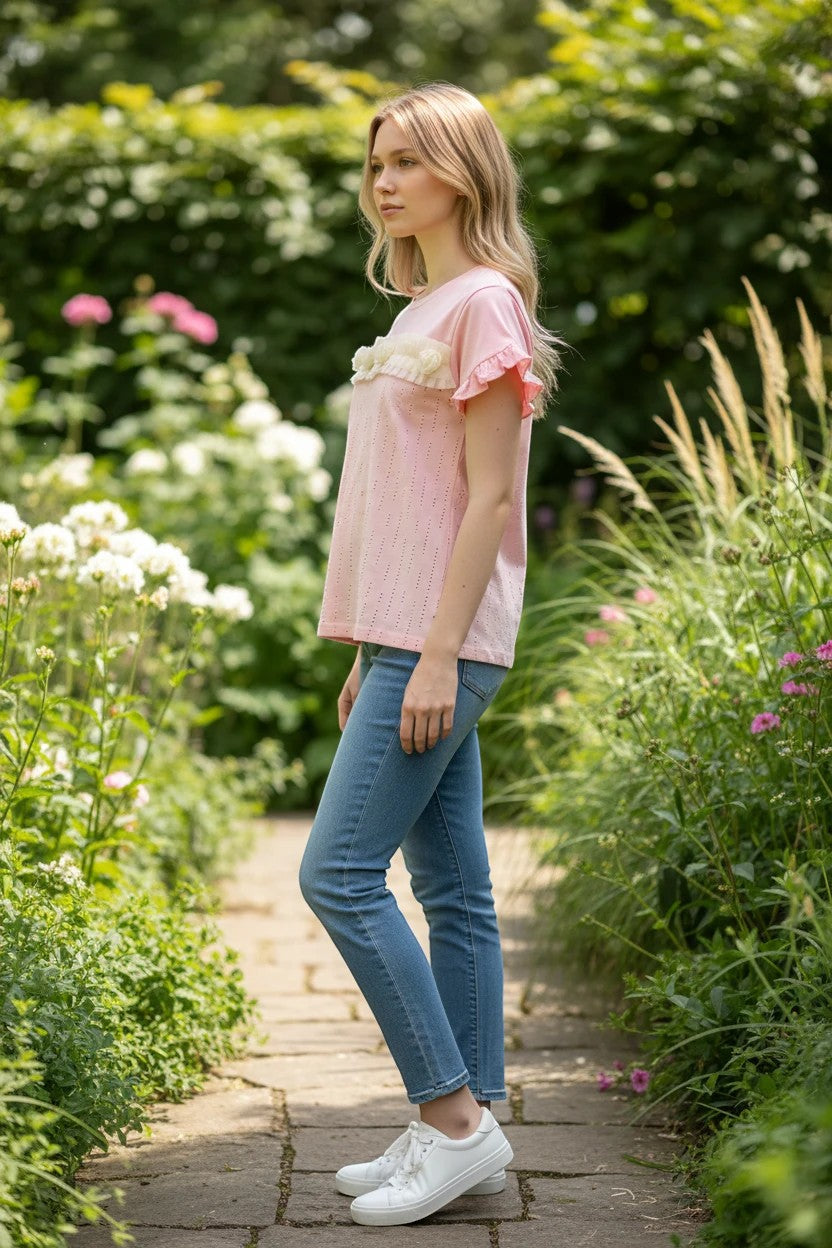 The Nile Luxuries pink cotton t-shirt with ruffled sleeves and floral chest embellishments.