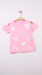 The Nile Luxuries pink cotton t-shirt with cold shoulder design and assorted heart prints, some with glitter.