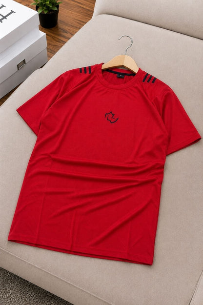 The Nile Luxuries red crew neck t-shirt with black graphic logo on chest and striped detail on shoulders.
