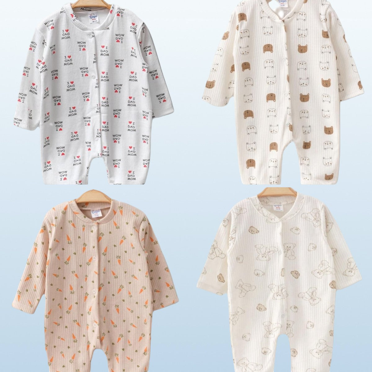 The Nile Luxuries ribbed knit baby sleepsuit with footies in white with 'DAD MOM' print, cream with bear print, peach with carrot print, and white with bunny print.